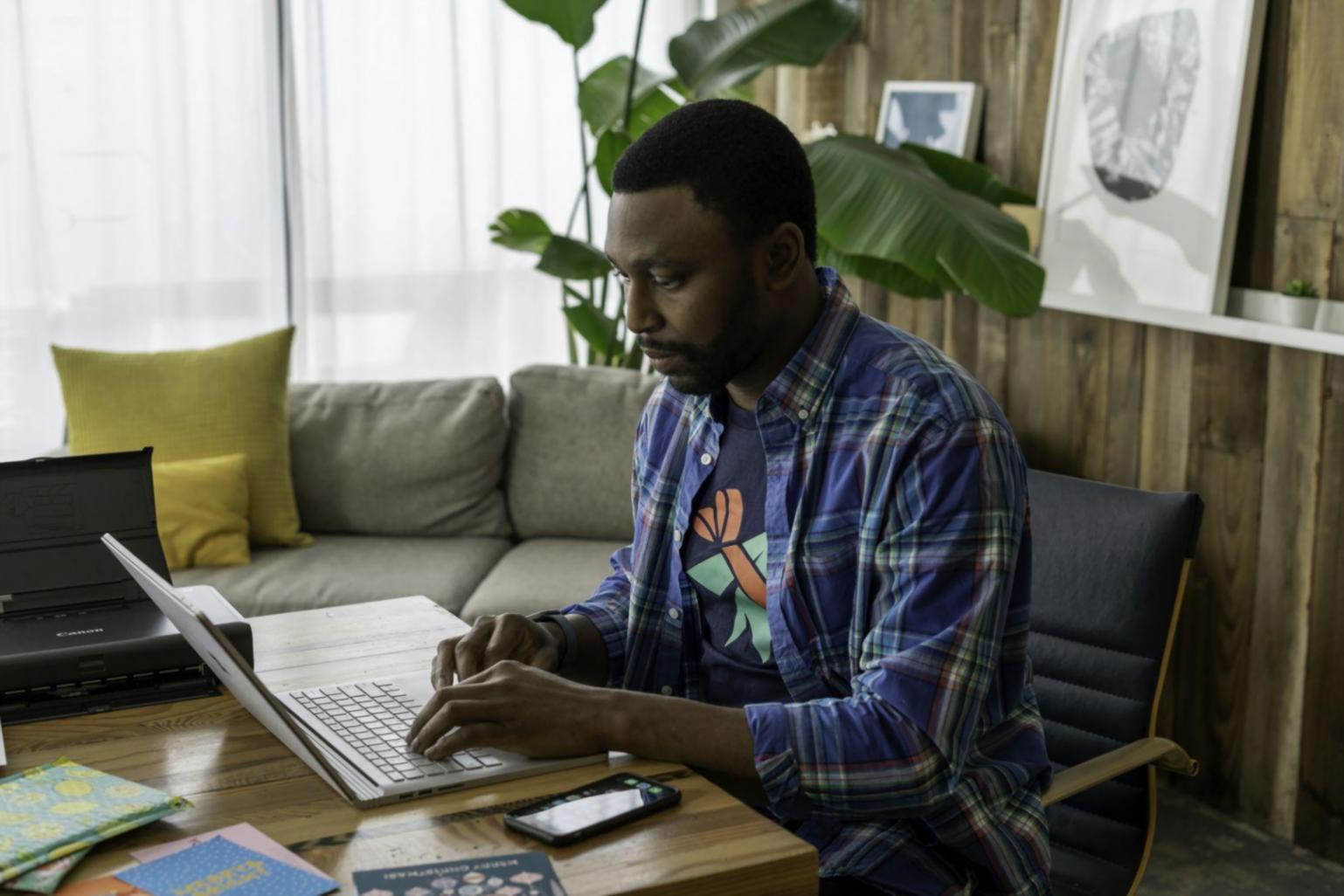 Business professional analyzing financial forecasting results on computer