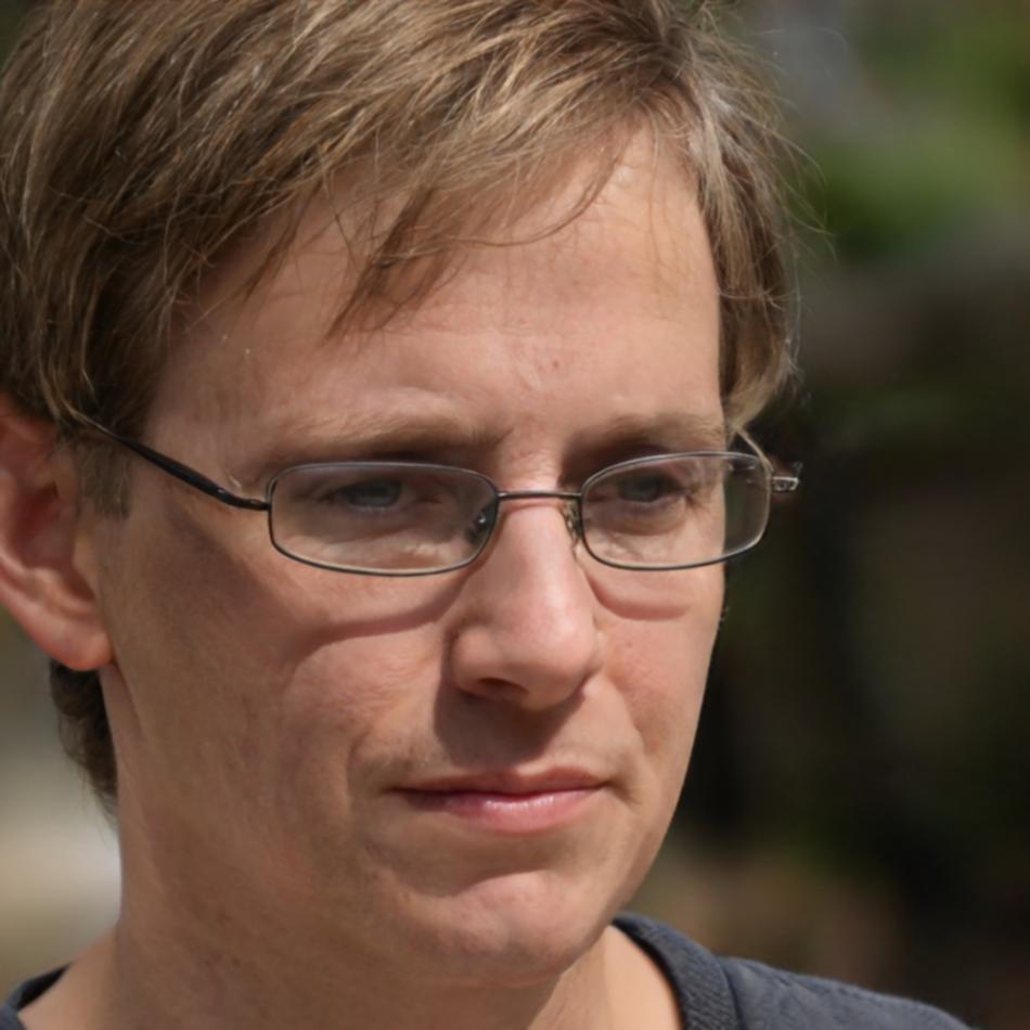 Professional headshot of Cameron Rothwell, Investment Research Director